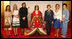 Spouses of G-8 leaders pose with a model dressed in a Junihitoe, a 12-layered ancient kimono, following a demonstration of traditional Japanese culture Monday, July 7, 2008, in Toyako, Japan. From left, the spouses are: Mrs. Margarida Uva Barroso, Mrs. Laureen Harper, Mrs. Sarah Brown, Mrs. Laura Bush, Mrs. Svetlana Medvedeva, and Mrs. Kiyoko Fukuda.