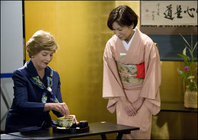 Mrs. Laura prepares a cup of tea during a ryureishiki Monday, July 7, 2008, in Toyako, Japan. Mrs. Bush was joined by other spouses of G-8 leaders during a traditional Japanese cultural program that included this version of the tea ceremony, where guests and host are seated in chairs instead of on their knees. Traced back to 1872, this particular version was created so that foreign guests at international expositions could more comfortably participate in the ceremonies.