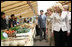 Mrs. Laura Bush joins spouses of the G-8 leaders as they visit the Hokkaido Marche (northern farm market), in Makkari Village Tuesday, July 8, 2008. The Hokkaido Marche was especially organized by the local residents on the occasion of the Summit, with the aim of illustrating the richness of locally produced foods.