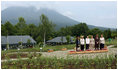 Mrs. Laura Bush and spouses of G-8 leaders pause for the family photo Tuesday, July 8, 2008, during their visit to the village of Makkari on the northern Japanese island of Hokkaido. From left are: Mrs. Margarida Uva Barosso, Mrs. Laureen Harper, Mrs. Kiyoko Fukuda, Mrs. Bush, Mrs. Sarah Brown and Mrs. Svetlana Medvedeva.