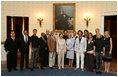 Mrs. Laura Bush poses with the winners of the 2008 Cooper-Hewitt National Design Awards at the White House on July 14, 2008. The awards are given in various disciplines such as communications, architecture, landscape, product, interior, fashion and people's design as well as in lifetime achievement, corporate achievement, special jury commendation. They awards are a tool to increase national awareness of design by promoting excellence, innovation and lasting achievement. The award program was first launched in 2000 at the White House as an official project of the White House Millennium Council.