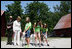 Mrs. Laura Bush meets students holding goats Monday, July 28, 2008, during a tour of the Old Goat Barn at the Carl Sandburg Home National Historic Site in Flat Rock, N.C. Mrs. Bush participated in Junior Ranger program events at the historical site and announced a $50,000 grant in support of the Junior Ranger programs.