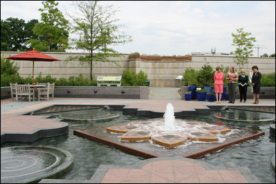 Mrs. Laura Bush views the grounds outside the United States Botanic Garden in Washington, D.C., Tuesday, June 3, 2008. Ms Holly Shimizu, Executive Director of the U.S. Botanic Garden, speaks to Mrs. Bush. Mrs. Lynne Cheney is at center, followed by Labor Secretary Elain Chao. Mrs. Grace Nelson, Chair of the Senate Spouses' Luncheon Committee, is behind Secretary Chao.