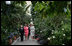 Mrs. Lynne Cheney, Mrs. Laura Bush, and Labor Secretary Elaine Chao are led on a tour of the United States Botanic Garden in Washington, D.C. by Mrs. Grace Nelson, Chair of the Senate Spouses' Luncheon Committee, Tuesday, June 3, 2008, prior to a luncheon honoring Mrs. Bush.