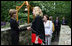 Mrs. Laura Bush greets the directors of Presidential Libraries Wednesday, June 4, 2008, at the entrance to Camp David's Evergreen Chapel in Thurmont, Maryland. Mrs. Bush shakes hands with Ms. Nancy Smith, Director of the National Archives' Presidential Material Staff in Alexandria, VA.