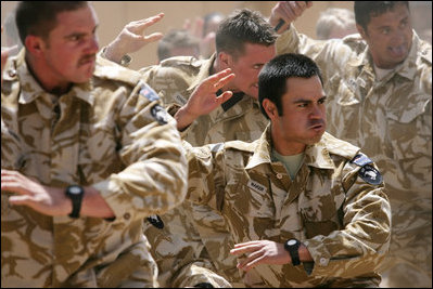 New Zealand soldiers perform a traditional warrior's dance Sunday, June 8, 2008, during a welcoming ceremony for Mrs. Laura Bush at the Bamiyan Provincial Reconstruction Team Base in Afghanistan's Bamiyan province.