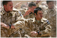 New Zealand soldiers perform a traditional warrior's dance Sunday, June 8, 2008, during a welcoming ceremony for Mrs. Laura Bush at the Bamiyan Provincial Reconstruction Team Base in Afghanistan's Bamiyan province.