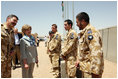 Mrs. Laura Bush greets New Zealand troops during her welcoming ceremony Sunday, June 8, 2008, at the Bamiyan Provincial Reconstruction Team Base. New Zealand's military took over the Afghanistan military compound from U.S. troops in 2003.