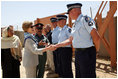 Mrs. Laura Bush greets New Zealand Police officers Sunday, June 8, 2008, during her visit to the Police Training Academy in Bamiyan, Afghanistan. Mrs. Bush traveled to Afghanistan to highlight the continued U.S. commitment to the country and its President Hamid Karzai.