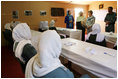 Mrs. Laura Bush and Governor Habiba Sarabi, in white, meet with female police trainees who will graduate June 15th from Non-Commissioned Officer Training during a visit Sunday, June 8, 2008, to the Police Training Academy in Bamiyan, Afghanistan.