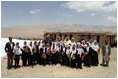 Mrs. Laura Bush is joined by Habiba Sarabi, Governor of Bamiyan Province, right, and students of the Ayenda Learning Center Sunday, June 8, 2008, during a tour of the school's construction site in Bamiyan, Afghanistan. 