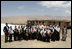 Mrs. Laura Bush is joined by Habiba Sarabi, Governor of Bamiyan Province, right, and students of the Ayenda Learning Center Sunday, June 8, 2008, during a tour of the school's construction site in Bamiyan, Afghanistan. 