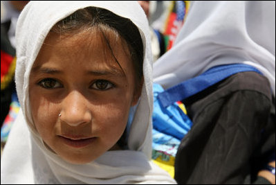 A young girl is seen outside of the Ayenda Learning Center during Mrs. Bush's visit Sunday, June 8, 2008, in Bamiyan, Afghanistan. 