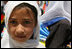 A young girl is seen outside of the Ayenda Learning Center during Mrs. Bush's visit Sunday, June 8, 2008, in Bamiyan, Afghanistan. 