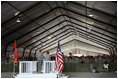 Mrs. Laura Bush delivers remarks to US troops during her visit to Bagram Air Force Base Sunday, June 8, 2008, in Bagram, Afghanistan.