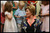 Mrs. Laura Bush talks to children during her visit to the United States Embassy Tuesday, June 10, 2008, in Kranj, Slovenia.