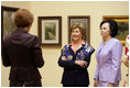 Mrs. Laura Bush and Slovenia's First Lady Barbara Miklic Turk listen as Dr. Barbara Jaki, right, conducts a tour of the impressionists exhibit at the National Gallery of Slovenia Tuesday, June 10, 2008 in Ljubljana, Slovenia.