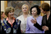 Mrs. Laura Bush and Slovenia's First Lady Barbara Miklic Turk listen as Dr. Barbara Jaki, right, conducts a tour of the National Gallery of Slovenia Tuesday, June 10, 2008 in Ljubljana, Slovenia.