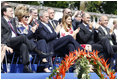 President George W. Bush and Laura Bush applaud during the Lipizzaner stallion exhibition Tuesday, June 10, 2008, at Brdo Castle in Kranj, Slovenia.