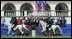 President George W. Bush and Mrs. Laura Bush attend the Lipizzaner Horse Exhibition Tuesday, June 10, 2008, at Brdo Castle in Kranj, Slovenia.