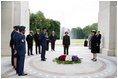 Mrs. Laura Bush pauses for a moment of silence after laying a wreath at the Lafayette Escadrille Memorial Wednesday, June 11, 2008, in Marnes la Coquette, France.