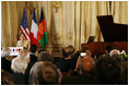 Mrs. Laura Bush delivers remarks during reception with United States - Afghan Donor's Conference Wednesday, June 11, 2008, at the Ambassador's Residence in Paris.