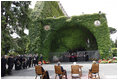 President George W. Bush and Mrs. Laura Bush join Pope Benedict XVI and Cardinal Tarcisio Bertone, Secretary of State, Vatican, as they watch a performance by The Pontifical Sistine Choir Friday, June 13, 2008, in the Lourdes Grotto at the Vatican.