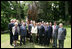 President George W. Bush, Laura Bush, and members of the U.S. delegation, join French President Nicolas Sarkozy and members of the French delegation, for a group photo following the unveiling of the Flamme de la Liberté sculpture Saturday, June 14, 2008, at the U.S. Ambassador's residence in Paris.