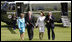 President George W. Bush and Laura Bush are met by U.S. Ambassador Robert Holmes Tuttle and his wife, Maria, Sunday, June 16, 2008, on their arrival to the ambassador's residence Winfield House in London.