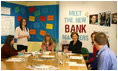 Mrs. Laura Bush participates in a Northern Ireland Youthbank training activity in Belfast, Northern Ireland, Monday, June 16, 2008. The Youthbank students review a grant application and then vote on accepting or declining the application for funding. 