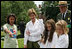 Mrs. Bush observes students of the Boys and Girls Club of Boston and Warren Prescott Elementary School who are planting gardens in the Charlestown Navy Yard Sunday, June 22, 2008 in Boston, MA, during a First Bloom event aimed at introducing children to plant species native to their area and educating kids about seed cultivation, garden design, and monitoring species.