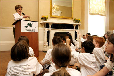 During remarks, Mrs. Bush calls on a student to name a type of plant they planted earlier in the day during National Park First Bloom event at the Charlestown Navy Yard in Boston, MA, Sunday, June 22, 2008.