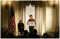 Mrs. Laura Bush speaks at the 2008 Annual Meeting of the Association of American Publishers Wednesday, March 5, 2008, at the Yale Club in New York City. Looking on is Patricia Schroeder, President and Chief Executive Officer of the group.