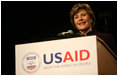 Mrs. Laura Bush delivers remarks Friday, March 7, 2008, during the USAID Celebration of International Women's Day at the Ronald Reagan Building in Washington, D.C. Mrs. Bush told her audience, "We're here today to tell our sisters around the world that we want them to join us. We're here to tell them that the long walk to freedom and equality, even though sometimes it might be a tiresome journey, that it's worth it. And the women of the United States are with them every single step of the way."