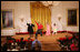 Mrs. Laura Bush, along with invited guests, watches a scene performance Friday, March 7, 2008 in the East Room of the White House, from the theater production of Chasing George Washington: A White House Adventure. The play is part of the Kennedy Center Performances for Young Audiences Series.