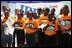 A choir sings a welcome song for Mrs. Laura Bush during her visit to the IDEJEN educational program at the College de St. Martin Tours Thursday, March 13, 2007, in Port-au-Prince, Haiti.