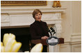 Mrs. Laura Bush welcomes guests to a tea Wednesday, March 19, 2008 in the State Dining Room at the White House, in honor of Nowruz, the Persian New Year celebration. A family-oriented holiday, Nowruz celebrates the Persian New Year and the coming of spring.