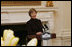 Mrs. Laura Bush welcomes guests to a tea Wednesday, March 19, 2008 in the State Dining Room at the White House, in honor of Nowruz, the Persian New Year celebration. A family-oriented holiday, Nowruz celebrates the Persian New Year and the coming of spring.