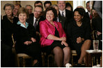 Mrs. Laura Bush is joined by Therese Rein, wife of Australian Prime Minister Kevin Rudd, and U.S. Secreatry of State Condoleezza Rice, right, during the joint press availability with President George W. Bush and Prime Minister Rudd Friday, March 28, 2008, in the East Room of the White House.