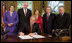 President George W. Bush signs H.R. 4286, Congressional Gold Medal: Daw Aung San Suu Kyi, during a ceremony Tuesday, May 6, 2008, in the Oval Office. The bill awards a congressional gold medal to the Nobel Laureate for her courageous and unwavering commitment to peace, nonviolence, human rights and democracy in Burma. Joining him for the signing are Mrs. Laura Bush, Senator Dianne Feinstein, (D-CA.); Congressman Joe Crowley of New York; Senator Mitch McConnell, (R-KY), and Congressman Don Manzullo of Illinois.