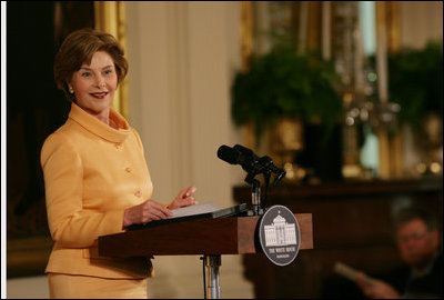 Mrs. Laura Bush welcomes guests to the East Room of the White House Monday, May 12, 2008, as she congratulates the recipients of the 2008 Preserve America Presidential Awards. The African Burial Ground Project, The Corinth and Alcorn County Mississippi Heritage Tourism Initiative, the Lower East Side Tenement Museum and the Texas Historic Courthouse Preservation Program were all honored for their efforts in preserving our national historic sites.