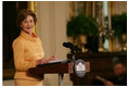 Mrs. Laura Bush welcomes guests to the East Room of the White House Monday, May 12, 2008, as she congratulates the recipients of the 2008 Preserve America Presidential Awards. The African Burial Ground Project, The Corinth and Alcorn County Mississippi Heritage Tourism Initiative, the Lower East Side Tenement Museum and the Texas Historic Courthouse Preservation Program were all honored for their efforts in preserving our national historic sites.