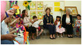 Mrs. Laura Bush joins students at Hand in Hand School for Jewish-Arab Education Wednesday, May 14, 2008, during her visit to Jerusalem. Joining her on the tour of the school that provides integrated, bilingual education to Jewish and Arab students in Israel is Mrs. Aliza Olmert, spouse of Israeli Prime Minister Ehud Olmert.