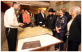 Mrs. Laura Bush and Mrs. Aliza Olmert, spouse of Israeli Prime Minister Ehud Olmert, listen to Mr. Mordechi Eliav, the Founder and Director of the Western Wall Heritage Foundation, during their visit to the Western Wall in Jerusalem Wednesday, May 14, 2008.