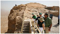 President George W. Bush and Mrs. Laura Bush stand with Mrs. Aliza Olmert, spouse of Israeli Prime Minister Ehud Olmert, as they listen to Eitan Campbell, Director of the Masada National Park, during a visit to the historic site Thursday, May 15, 2008, in Masada, Israel.