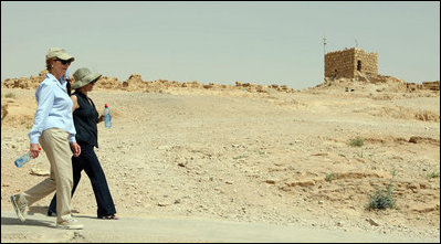 Mrs. Laura Bush and Mrs. Aliza Olmert walk a path at Masada National Park Thursday, May 15, 2008, during a tour of the historic site with their spouses.