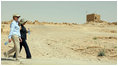 Mrs. Laura Bush and Mrs. Aliza Olmert walk a path at Masada National Park Thursday, May 15, 2008, during a tour of the historic site with their spouses.