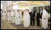 President George W. Bush and Mrs. Laura Bush are greeted by the Saudi delegation as they stand with King Abdullah bin Abdulaziz during arrival ceremonies Friday, May 16, 2008, at Riyadh-King Khaled International Airport in Riyadh.