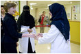 Mrs. Laura Bush meets medical personnel Friday, May 16, 2008, during her tour of the King Fahd Medical City facility in Riyadh, Saudi Arabia, where she discussed the success and progress of the U.S.-Saudi Partnership for Breast Cancer Awareness and Research.