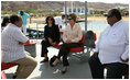 Mrs. Laura Bush listens to Dr. Mohamed Salem, Head of the South Sinai Protectorates, Egyptian Environmental Affairs Agency, as they prepare to depart for a coral reefs and ocean conservation tour Saturday, May 17, 2008, in Sharm El Sheikh, Egypt. Joining them are Ms. Hilda Arellano, USAID Cairo Mission Director, and Mr. Amir Ali, Hurghada Environmental Protection and Conservation Association. 